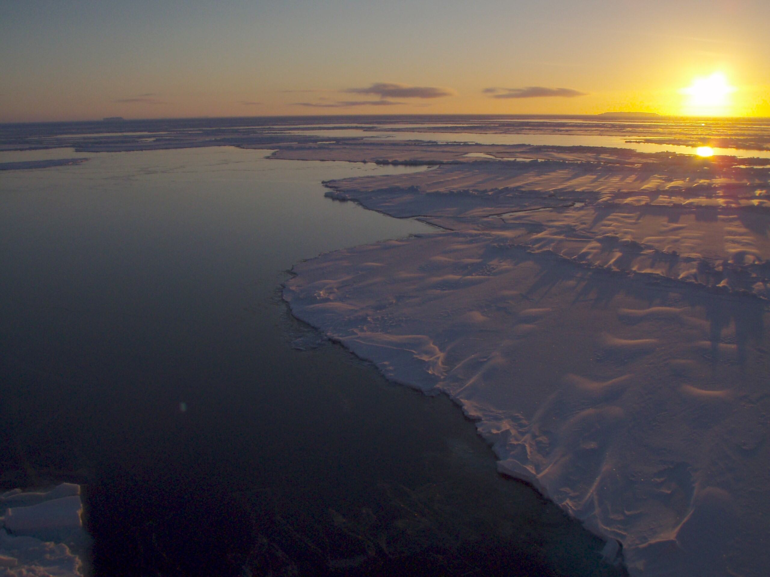 Sun low in the sky over Antarctic sea ice