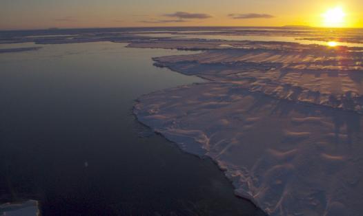 Sun low in the sky over Antarctic sea ice